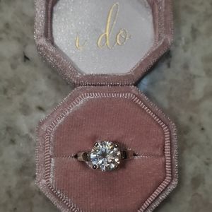 Moissanite and gold ring